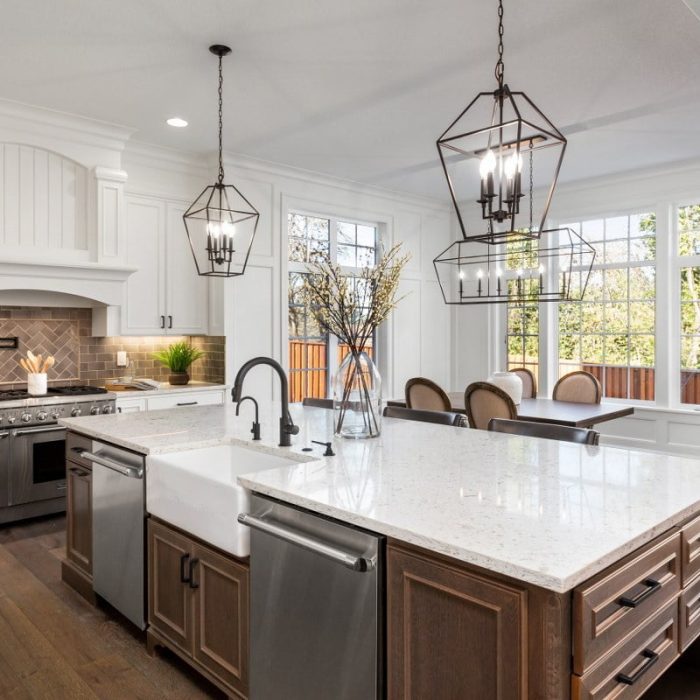 renovation_1200x800 Beautiful kitchen in new traditional style luxury home, with quartz counters, hardwood floors, and stainless steel appliances